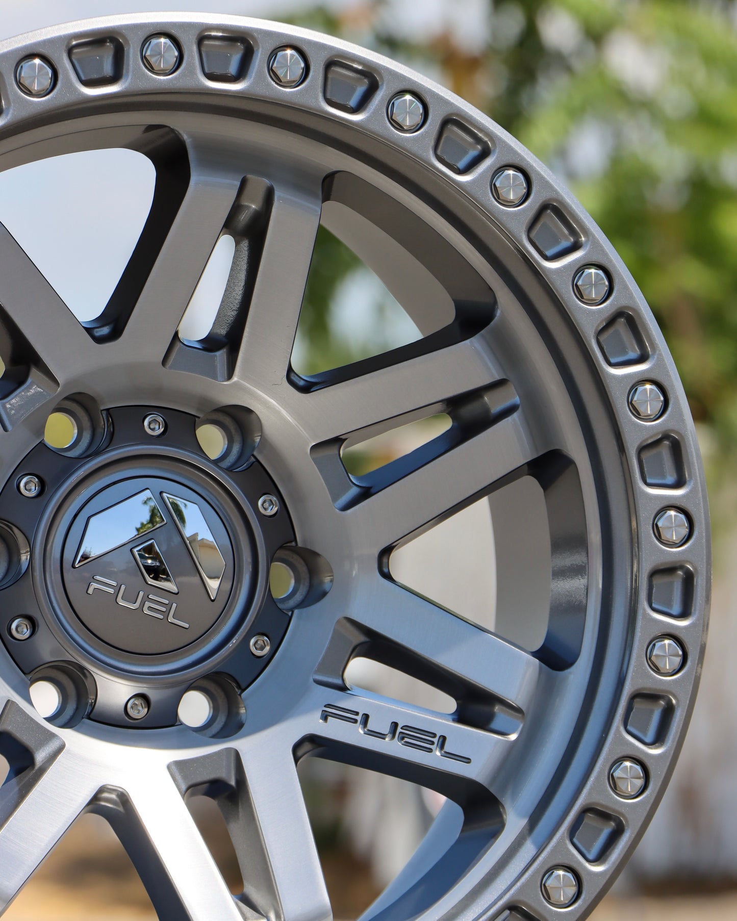 Close-up of the Fuel Syndicate Wheel showing the hubcap and a portion of the outer ring of the wheel.