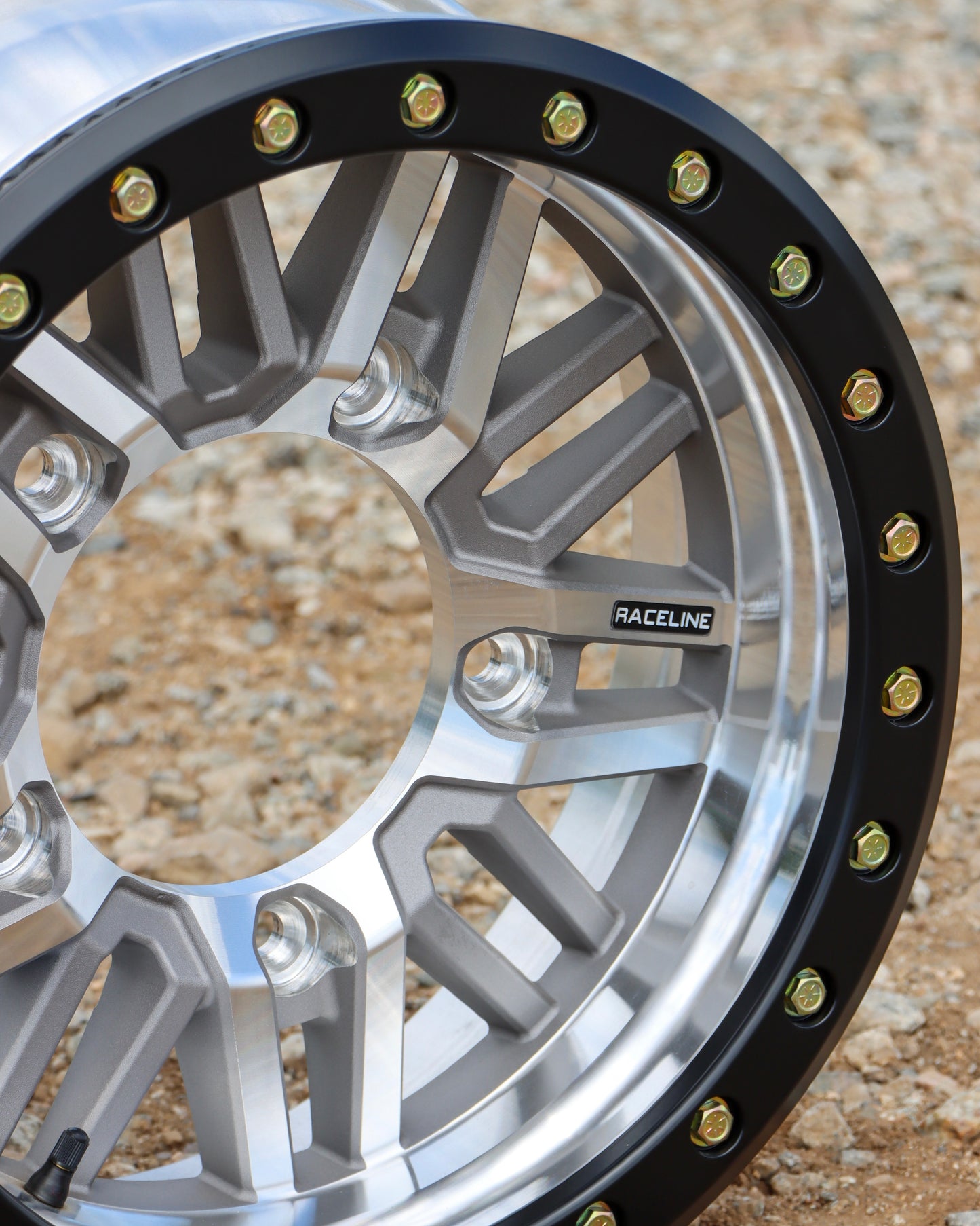 Close-up view of the raceline ryno buggy wheel in a machined with black ring finish.