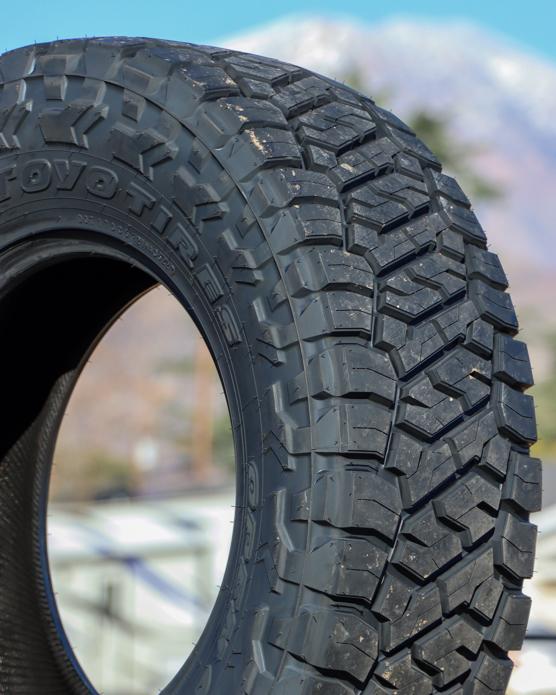 Closeup of tread and sidewall of the Toyo Open Country R/T Trail Tire.