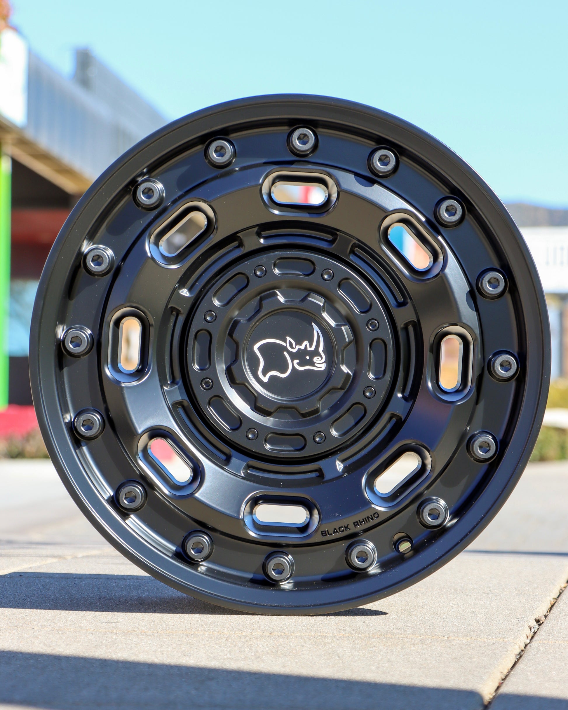 Black Rhino Atlas Wheel on the sidewalk.