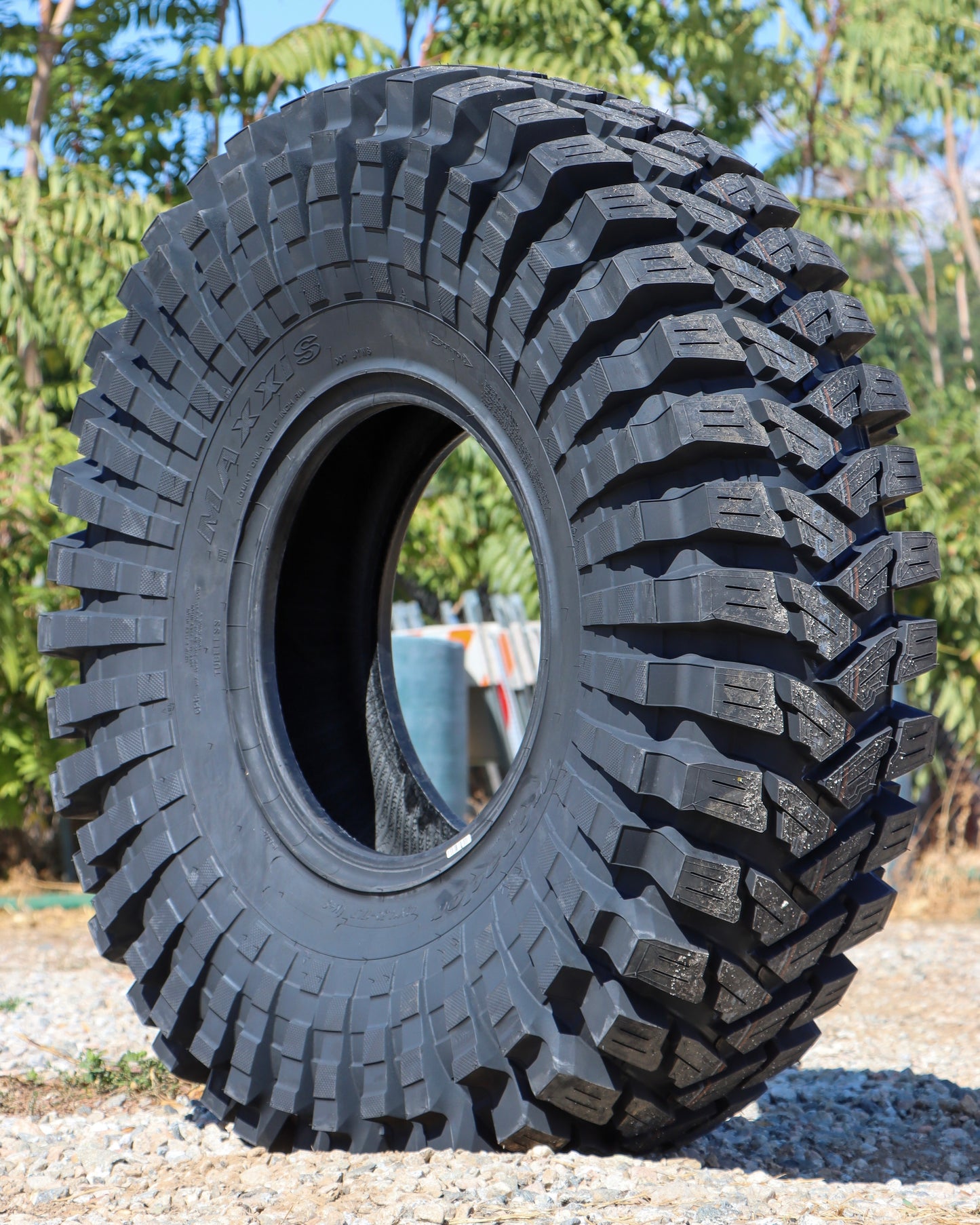 Maxxis trepador sitting in a field.