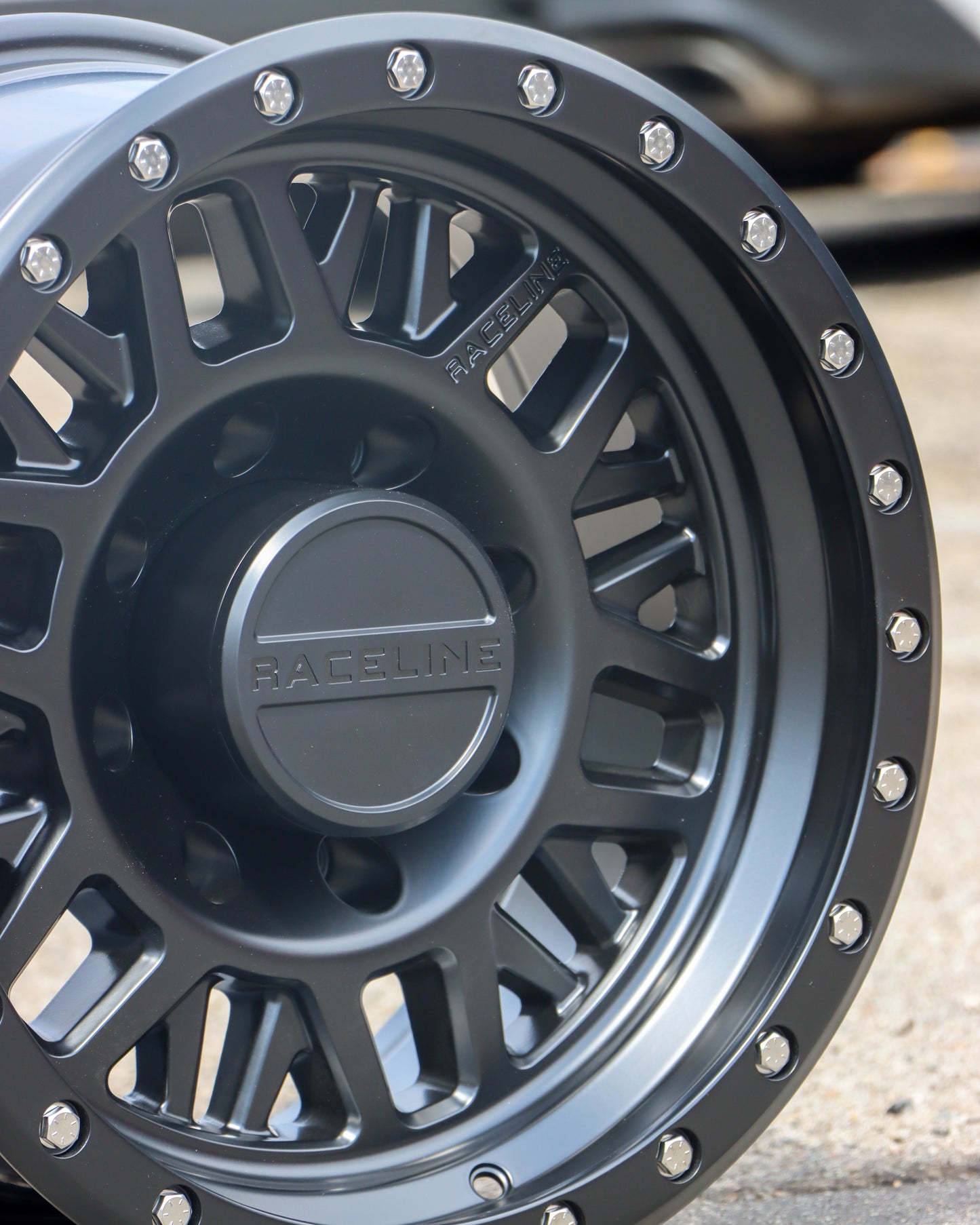 Close-up of the Raceline Ryno Wheel in a matte black finish.