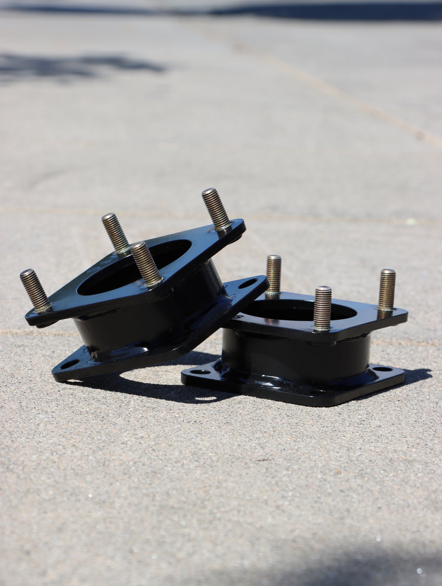 Strut Spacers on display on the ground.