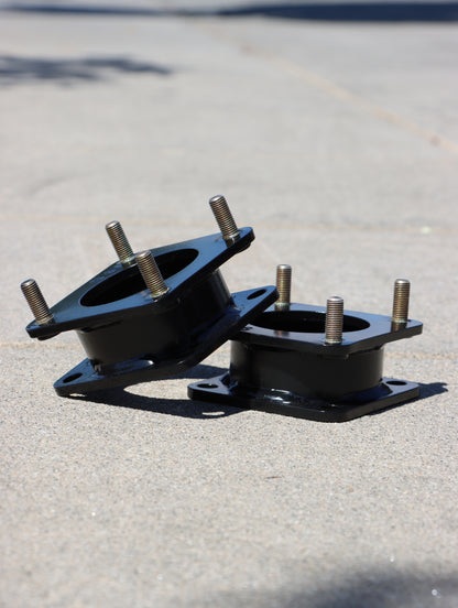 Strut Spacers on display on the ground.