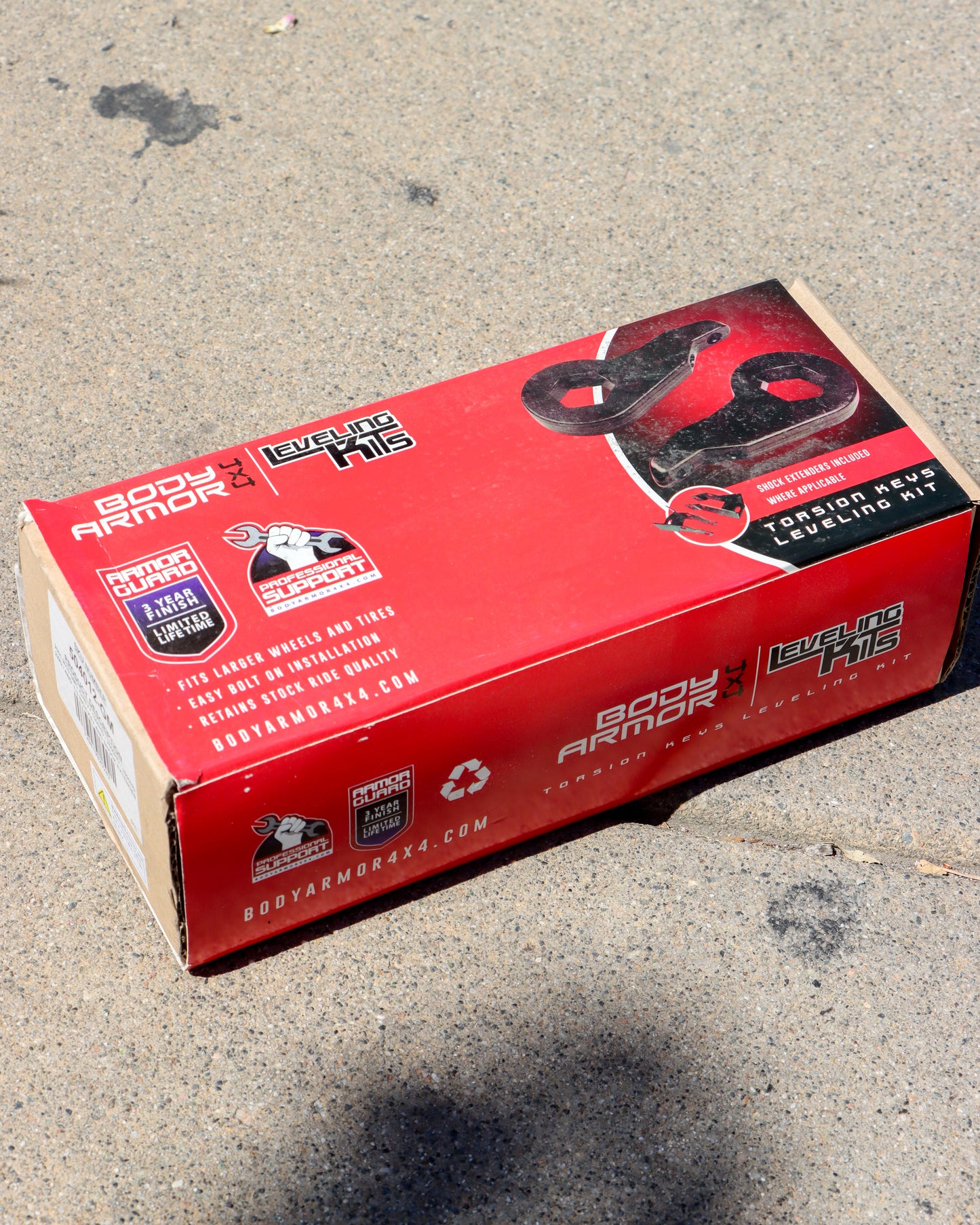 Torsion Key Leveling Kit Box on the ground.