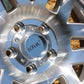 Close-up of the center cap of the kmc machete crawl bead lock wheel in a machined finish.