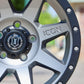 Close-up of the Icon Rebound Wheel in a silver/titanium finish,