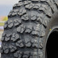 Close-up of the Yokohama Geolandar X-M/T tire showing the tread.