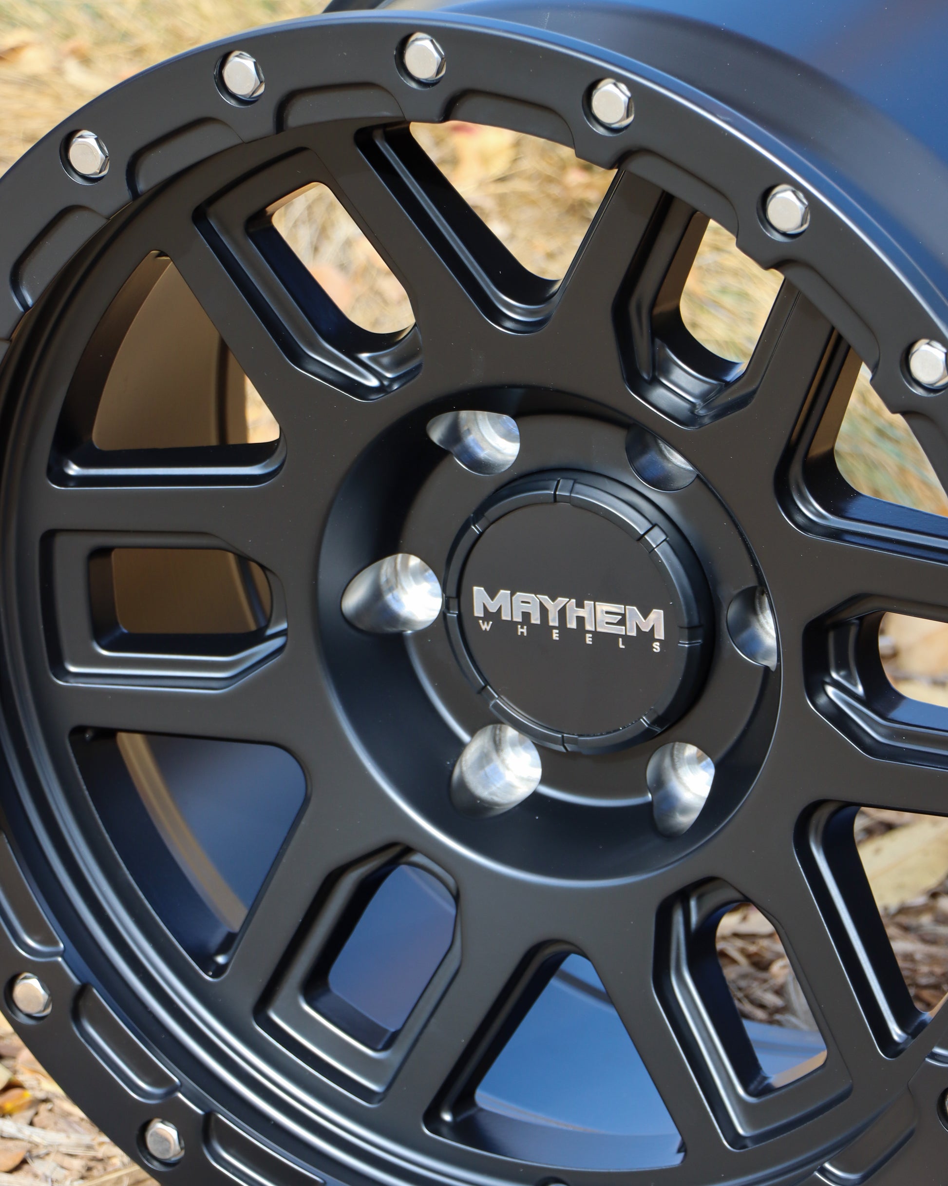 Close up of the mayhem delta wheel in a matte black finish.
