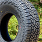 Close-up of Falken Wildpeak AT3 tire displaying the tread and side-wall.