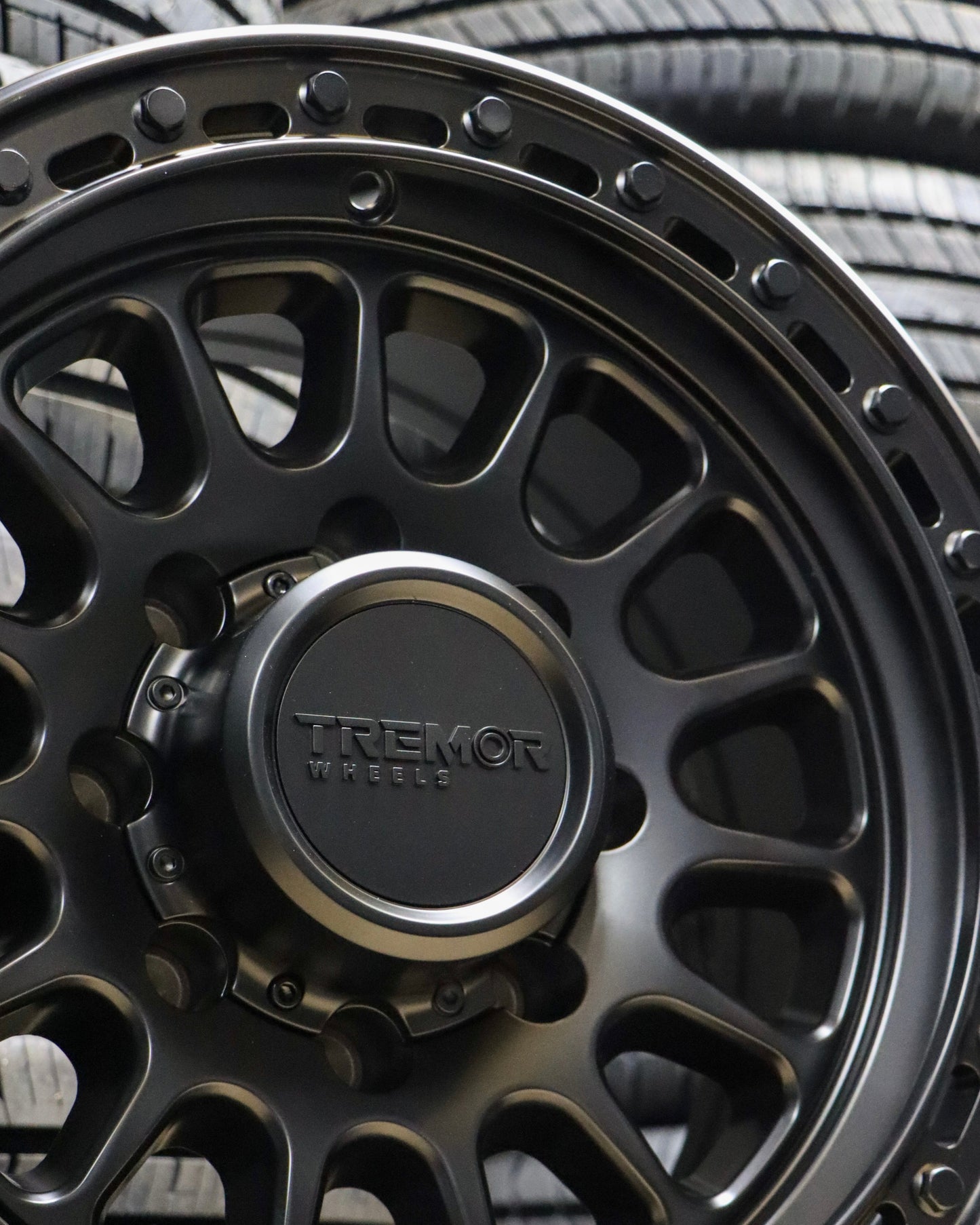 Close-up, of the tremor 104 aftershock in a satin black finish.