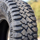 close-up of the mickey thompson deagan 38 tire showing mostly the tread and a little sidewall.