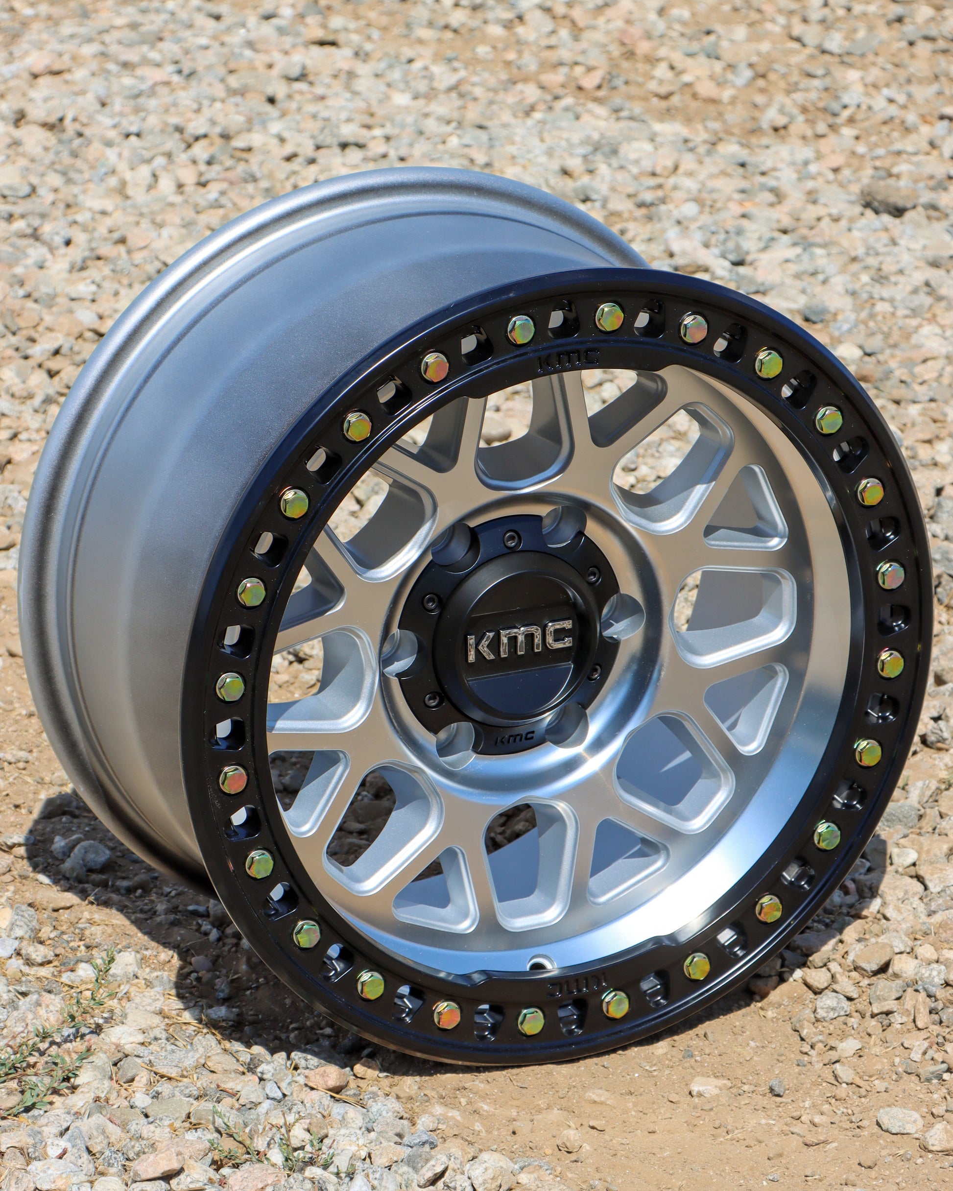angled picture of the kmc grs wheel in a machined finish with a black lip