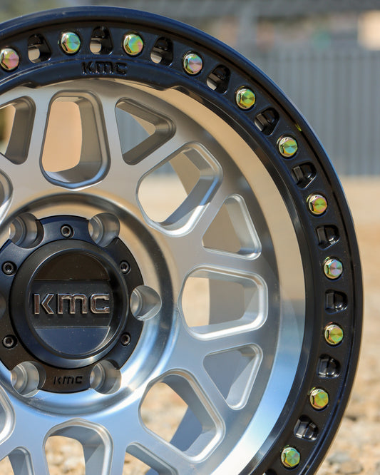 Closeup of thge kmc grs wheel in a machined finish with a black lip