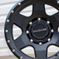 Close-up of the Raceline Boost wheel in a matte black finish.